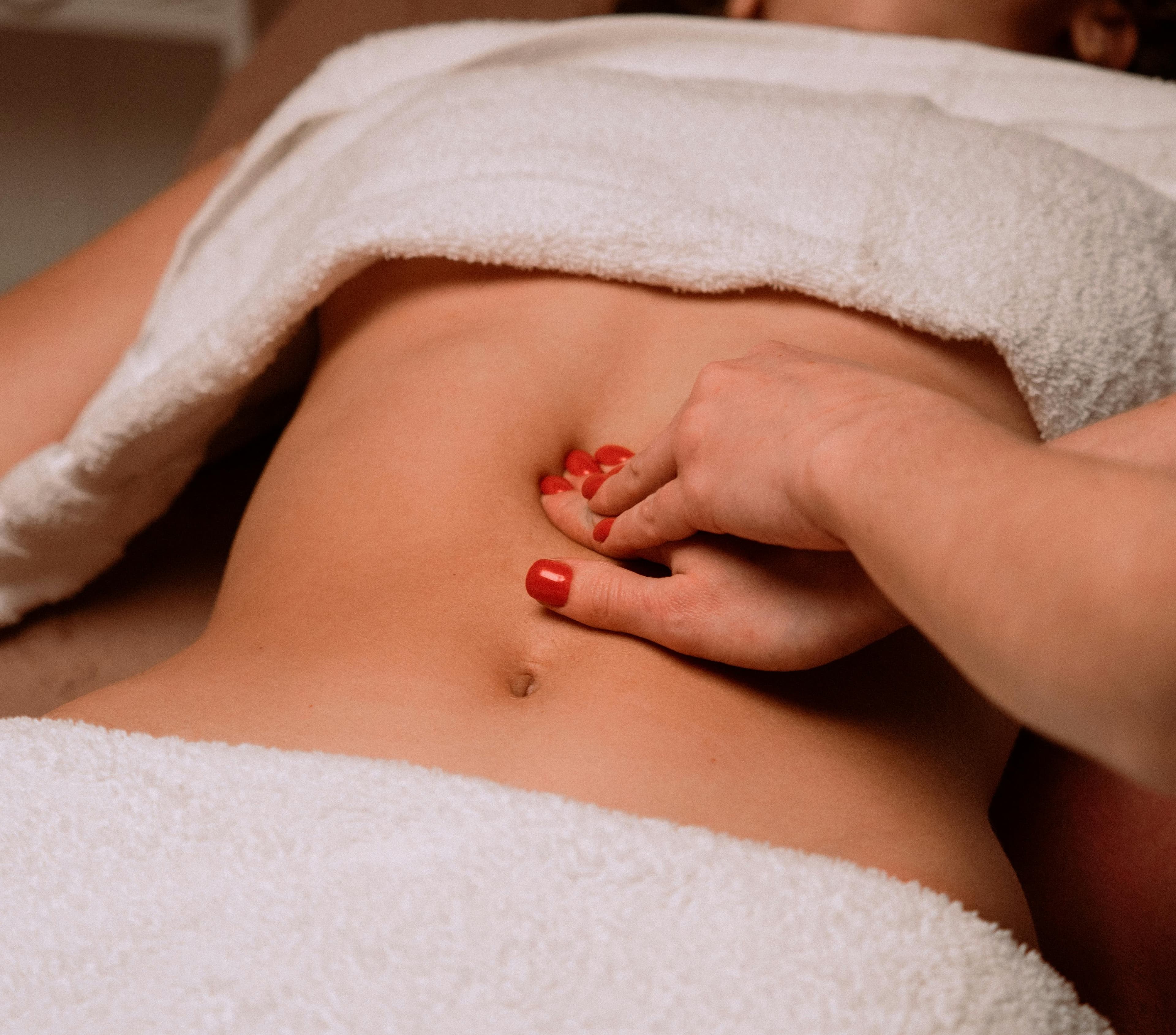 person receiving lymphatic drainage therapy
