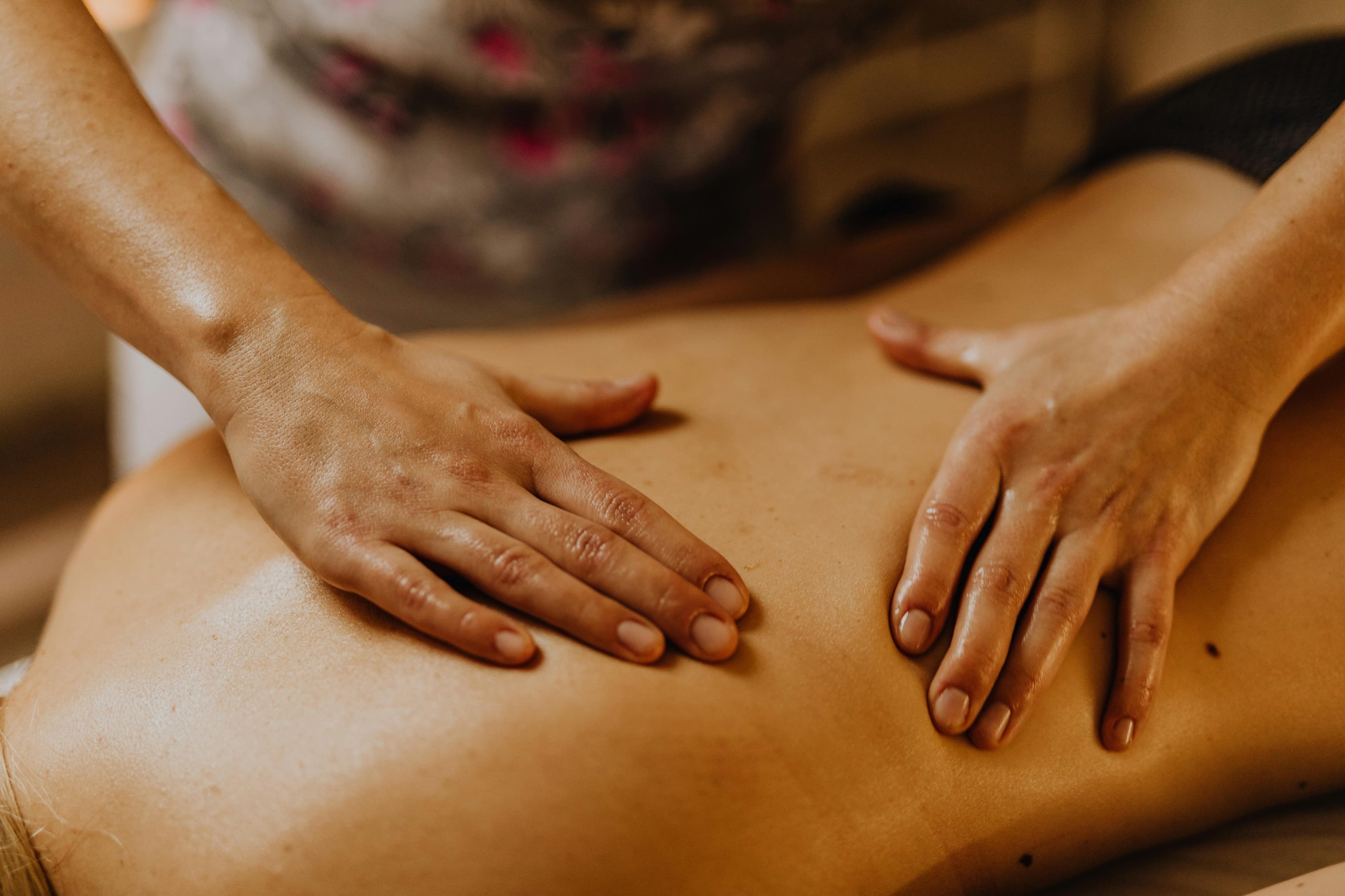 womaan getting a massage in a spa